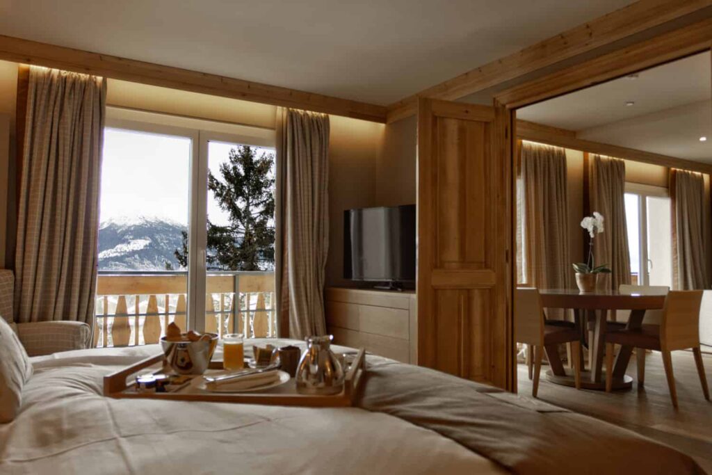 Bedroom of deluxe room in Hotel Royal Crans Montana