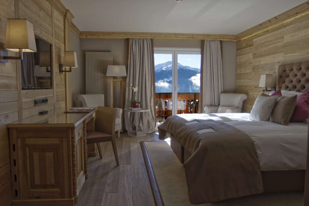 Superior room bedroom in Hotel Royal Crans Montana